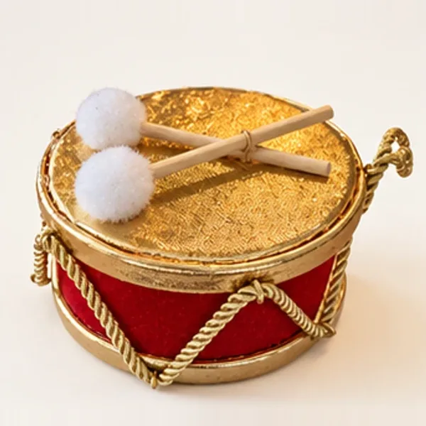 Trommel rood en goud, de trommel
